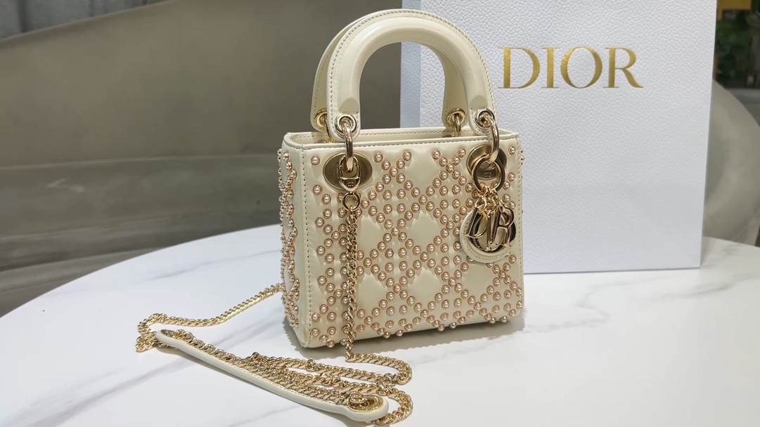 Dior Lady Di or three-frame pearl nails white