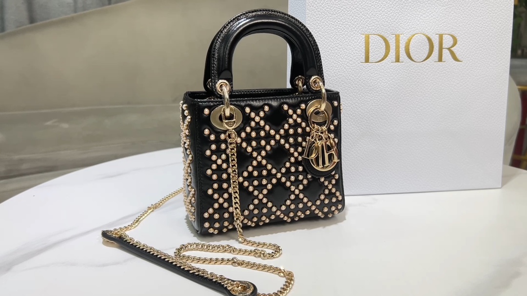 Dior Lady Di or three-frame pearl nails black