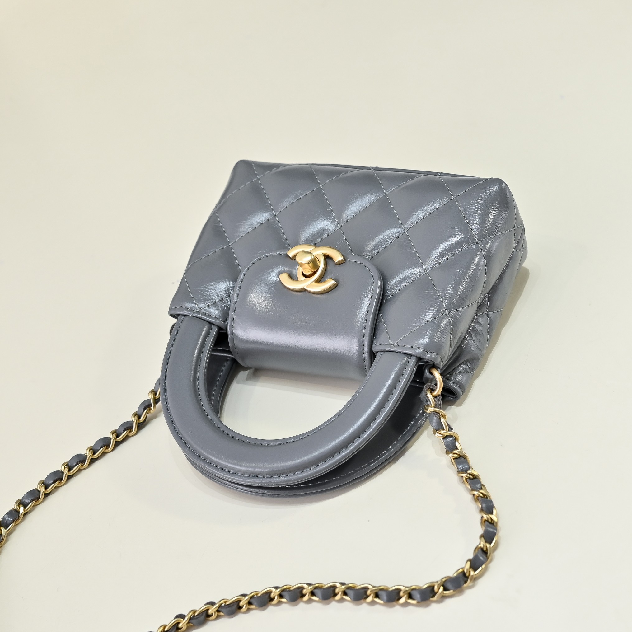 Chanel Style Grey Leather Top Handle Bag style reference detail image 3 from source 776489