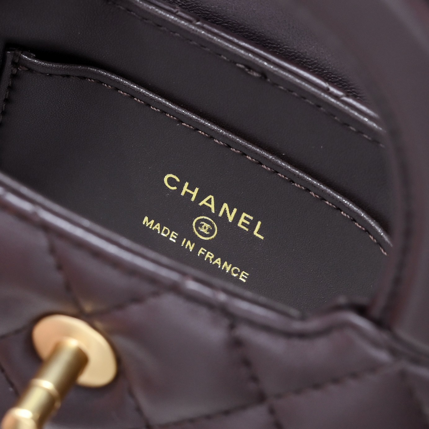 Chanel Style Brown Leather Top Handle Bag style reference detail image 7 from source 776491
