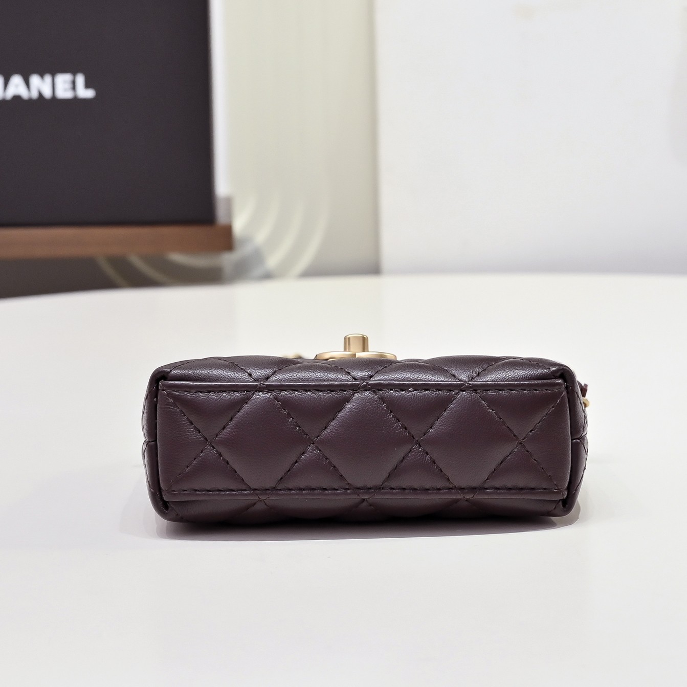 Chanel Style Brown Leather Top Handle Bag style reference detail image 3 from source 776491