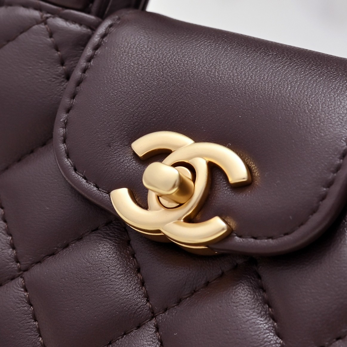 Chanel Style Brown Leather Top Handle Bag style reference detail image 4 from source 776491