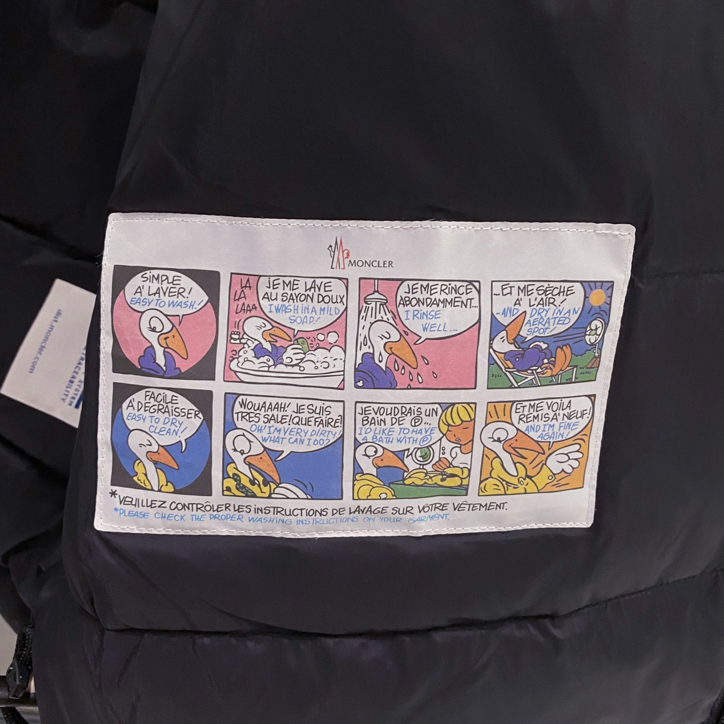 黑色特写篇展示……连帽三防羽绒服服防水，防风，防油污