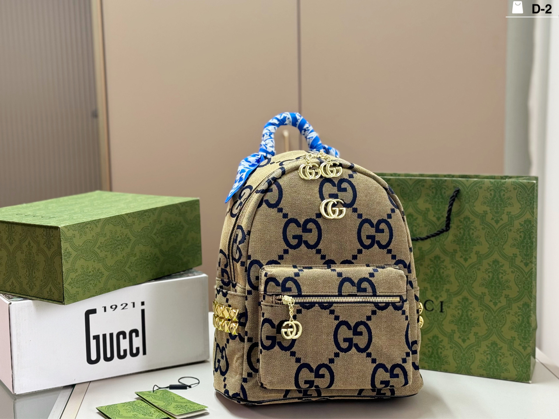 P225 | D-2 Size 26x31 | Gucci Gg Supreme Backpack, Made Of Environmentally Friendly Coated Canvas, With A Beige + Dark Blue Gg Pattern That Is Very Recognizable Metal Double G Logo + Blue Webbing Handle, Perfect Details