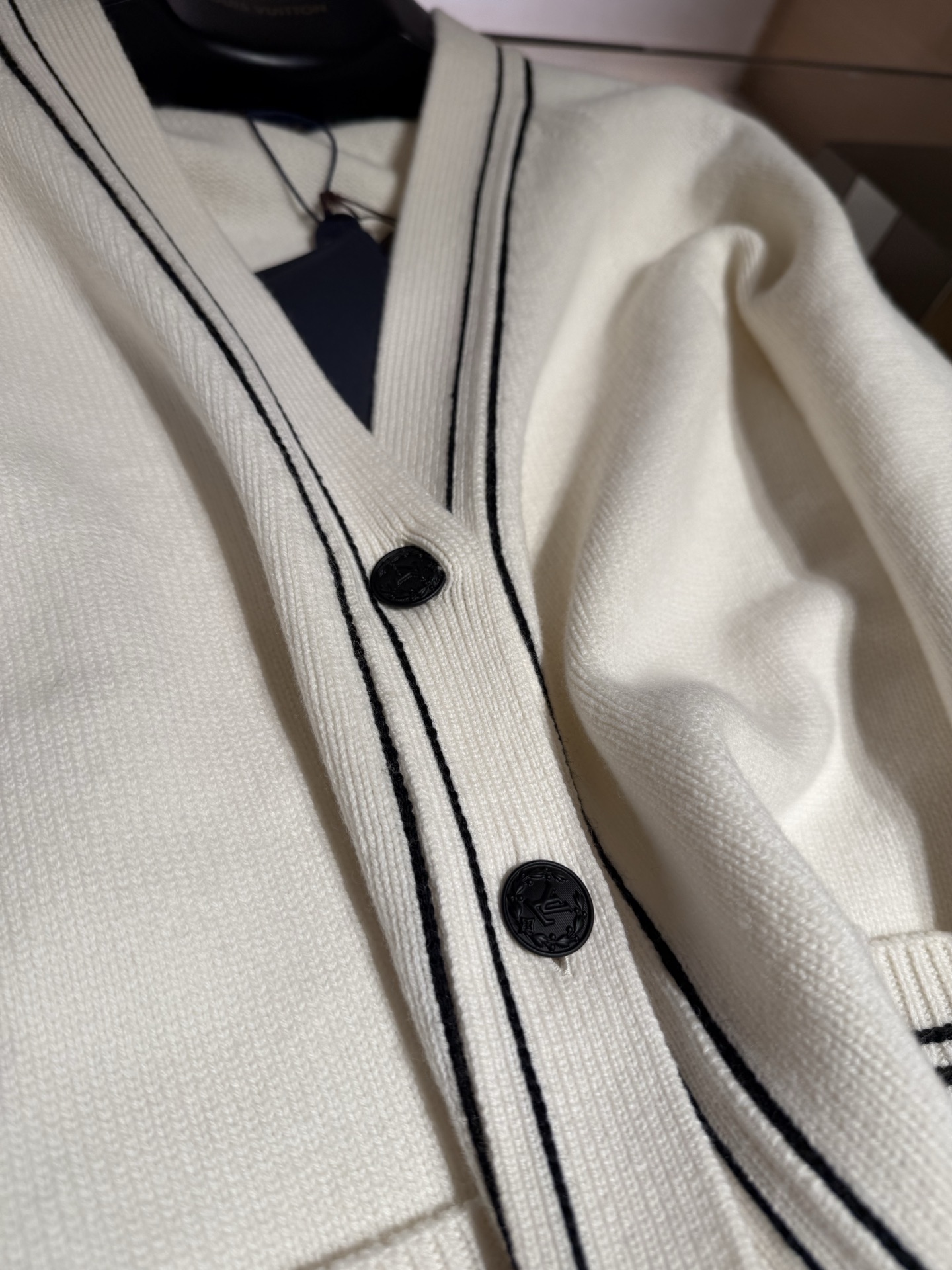 Sailboat series knit cardigan in white. Made from fine wool and cashmere blend. Comfortable fit, versatile styling. Contrast buttons, front pocket stripes, nautical style. 3D logo. Sizes: 36, 38, 40.-Big cat