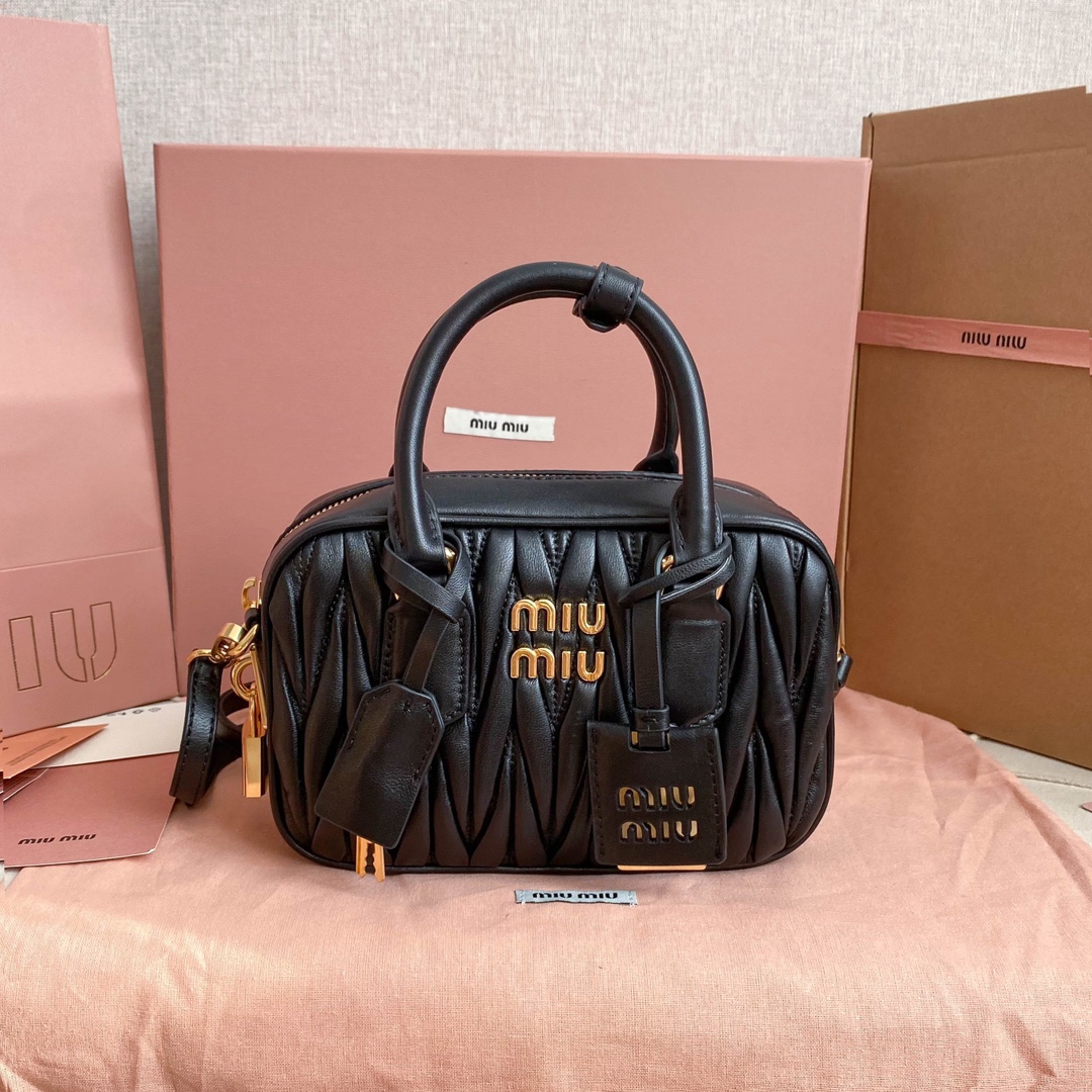 Miu Miu bowling bag lambskin Matelasse texture structured silhouette