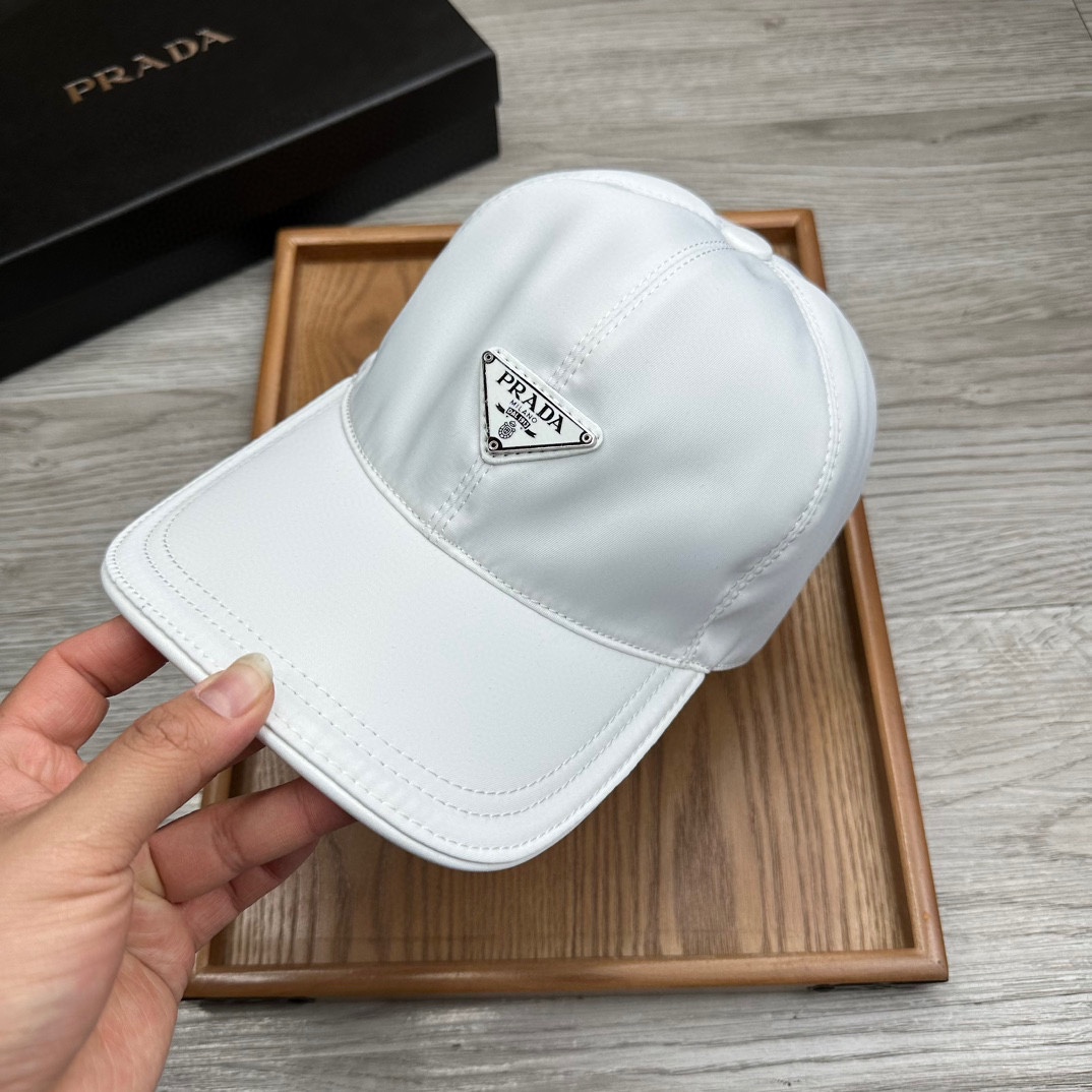 🌹。Prada家。三角标【超A品质】最新款！时尚潮流，高端做工！每一个帽子都是用心之作！牛津材质！头层牛