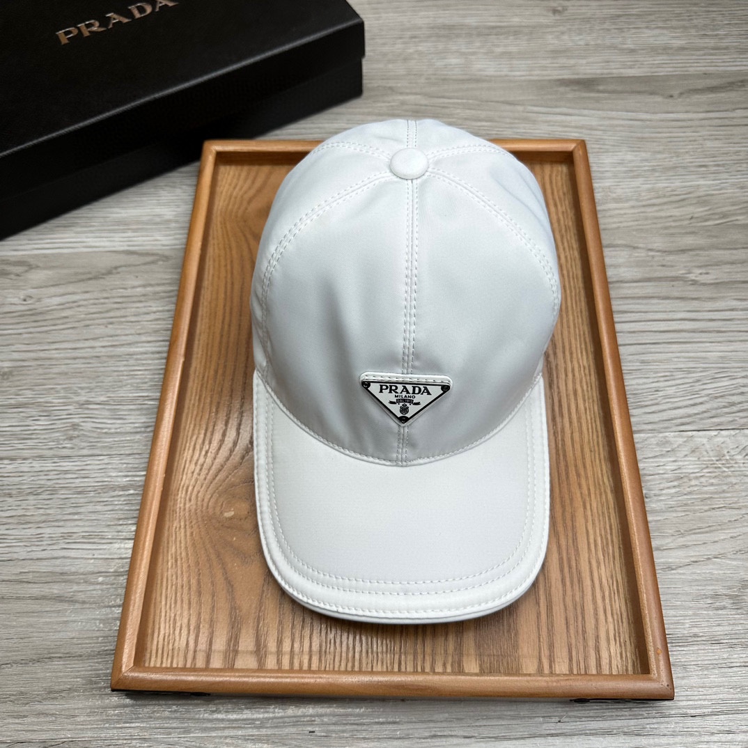 🌹。Prada家。三角标【超A品质】最新款！时尚潮流，高端做工！每一个帽子都是用心之作！牛津材质！头层牛