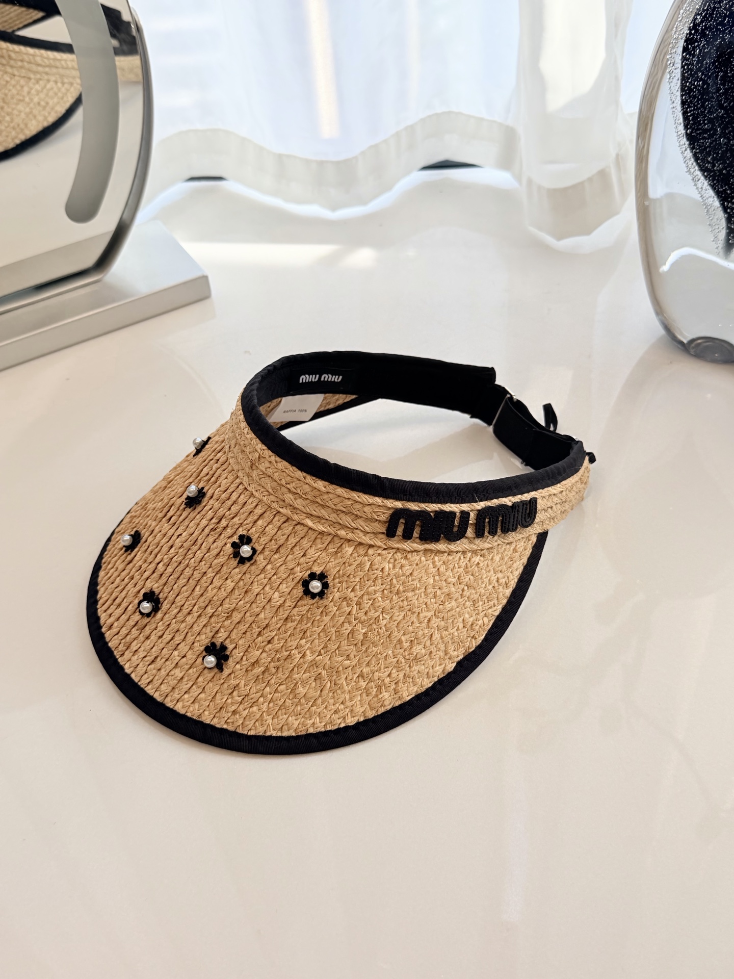 \nmiumiu拉菲草空顶帽
