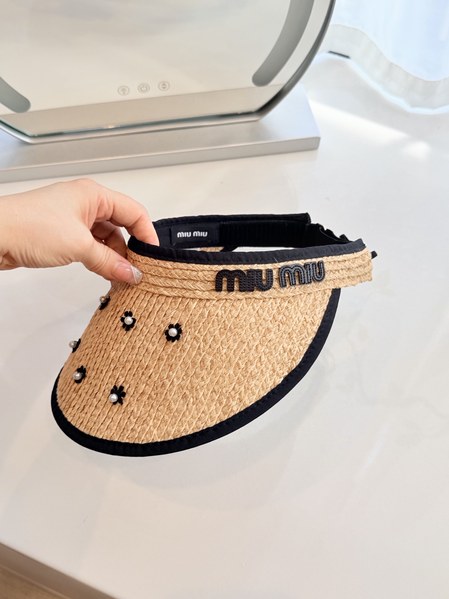 \nmiumiu拉菲草空顶帽
