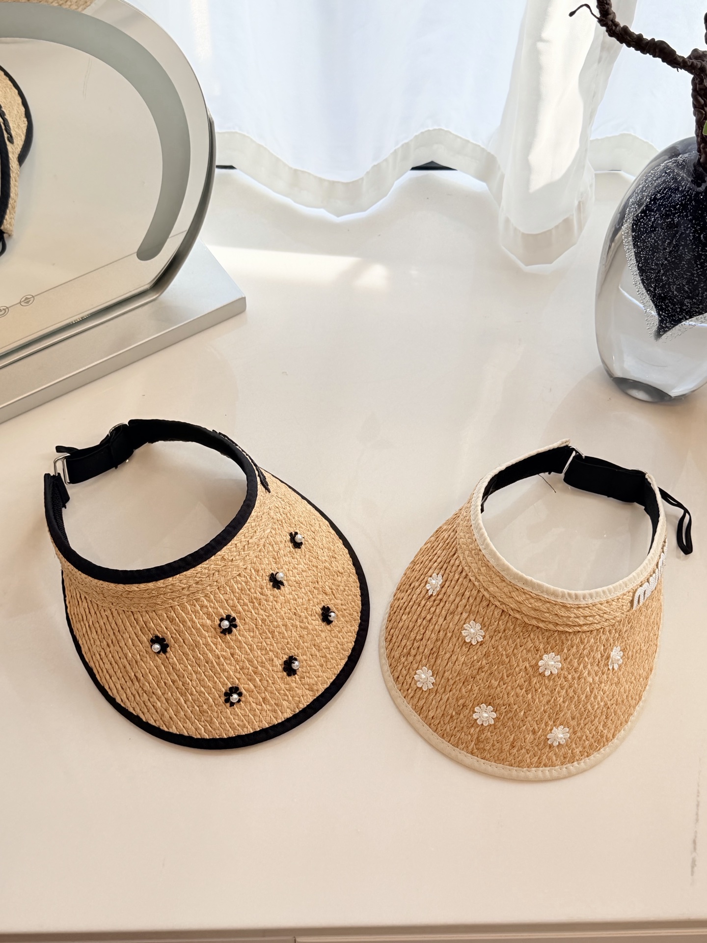 \nmiumiu拉菲草空顶帽