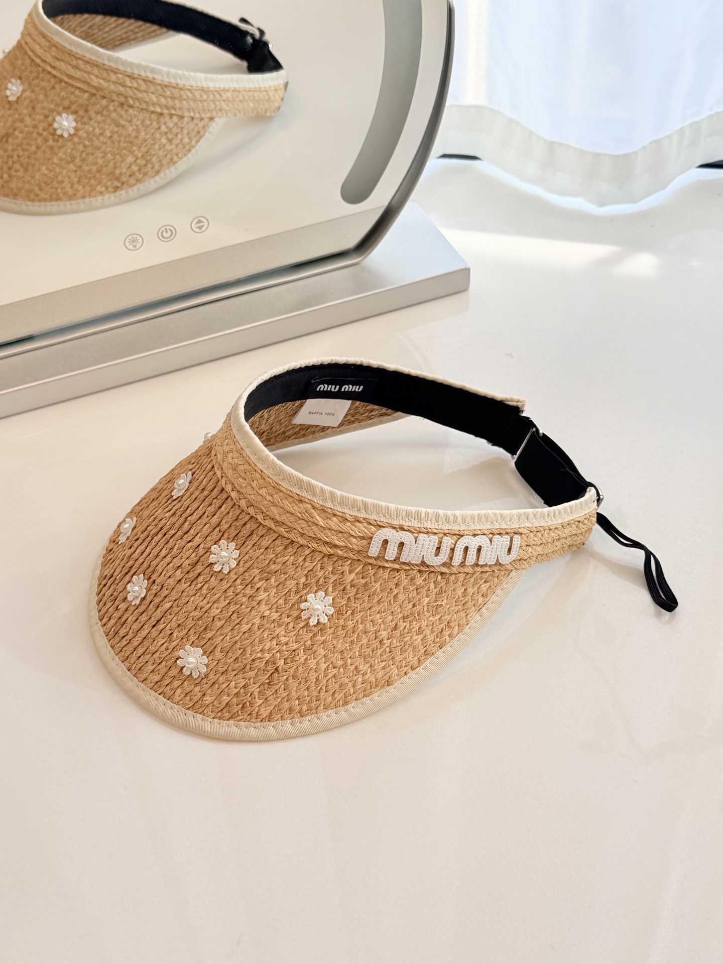 \nmiumiu拉菲草空顶帽