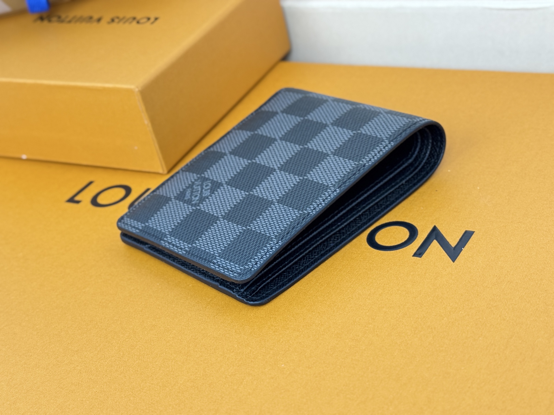 Louis Vuitton MULTIPLE短钱夹N62663 黑格采用炫酷帆布搭配柔软皮革內里