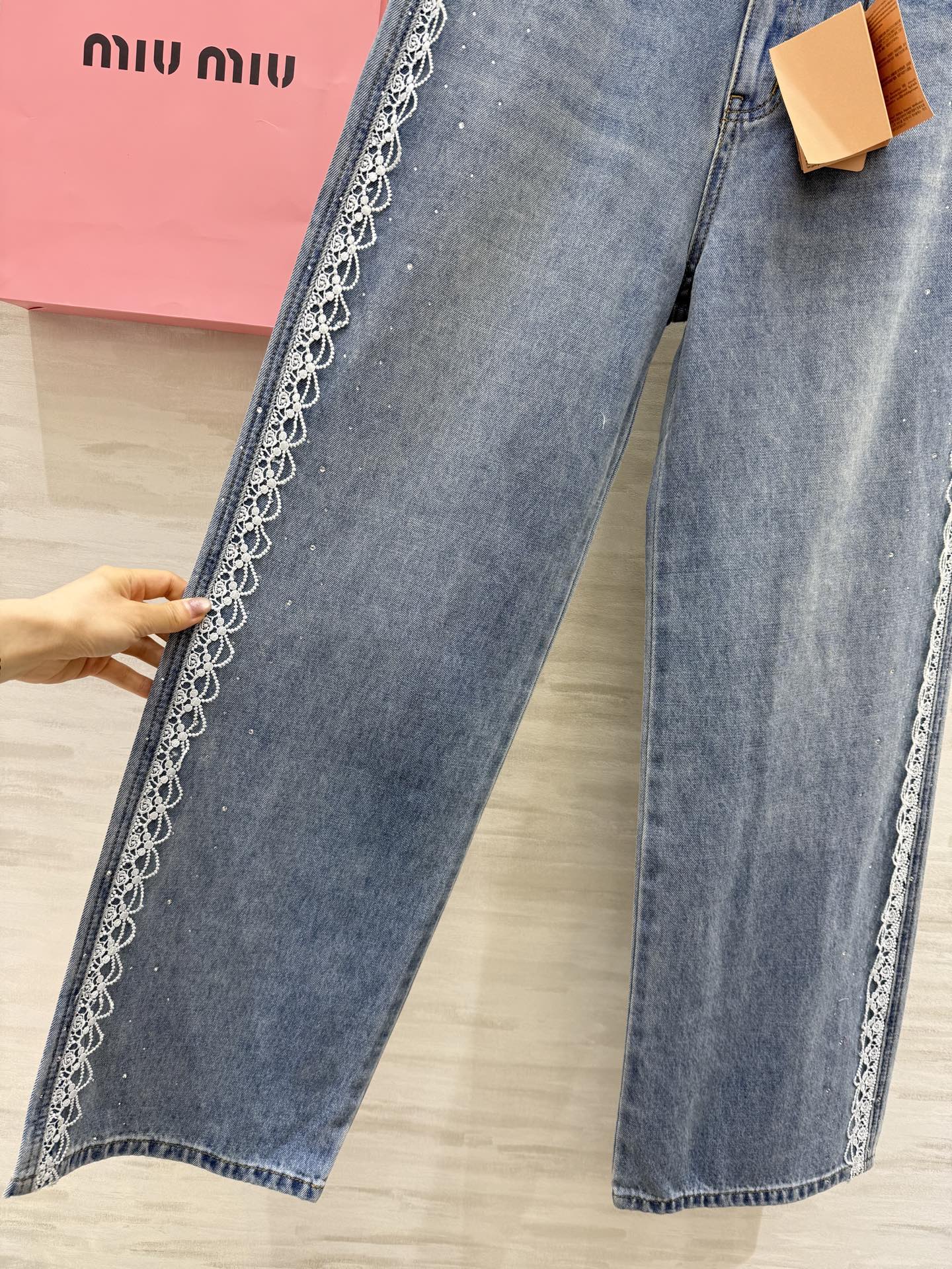 Miu Miu High-Waisted Straight-Leg Jeans with Embroidered & Rhinestone Details 6 i1751039096965 8098 0 4