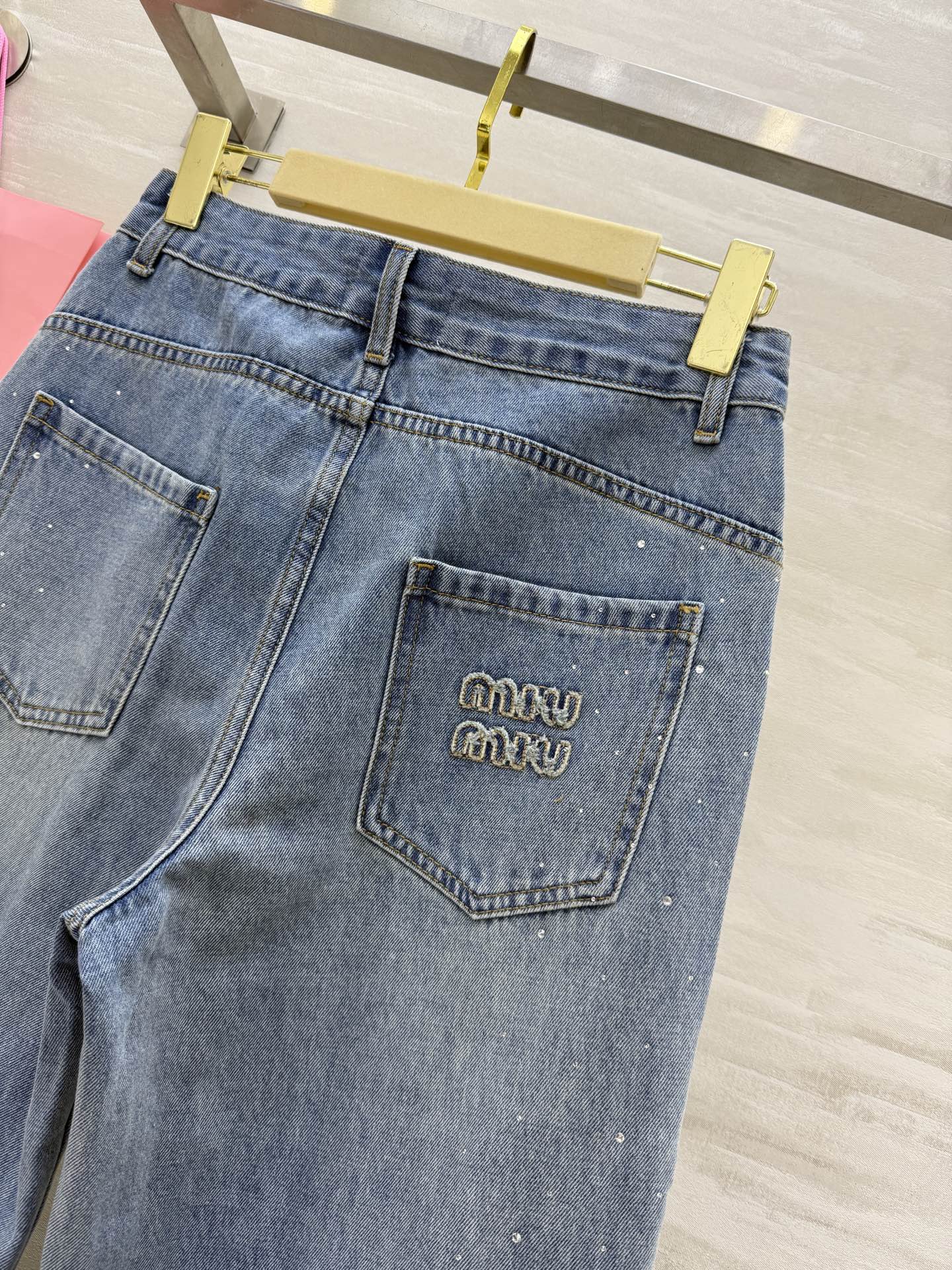 Miu Miu High-Waisted Straight-Leg Jeans with Embroidered & Rhinestone Details 7 i1751039098395 7256 0 5