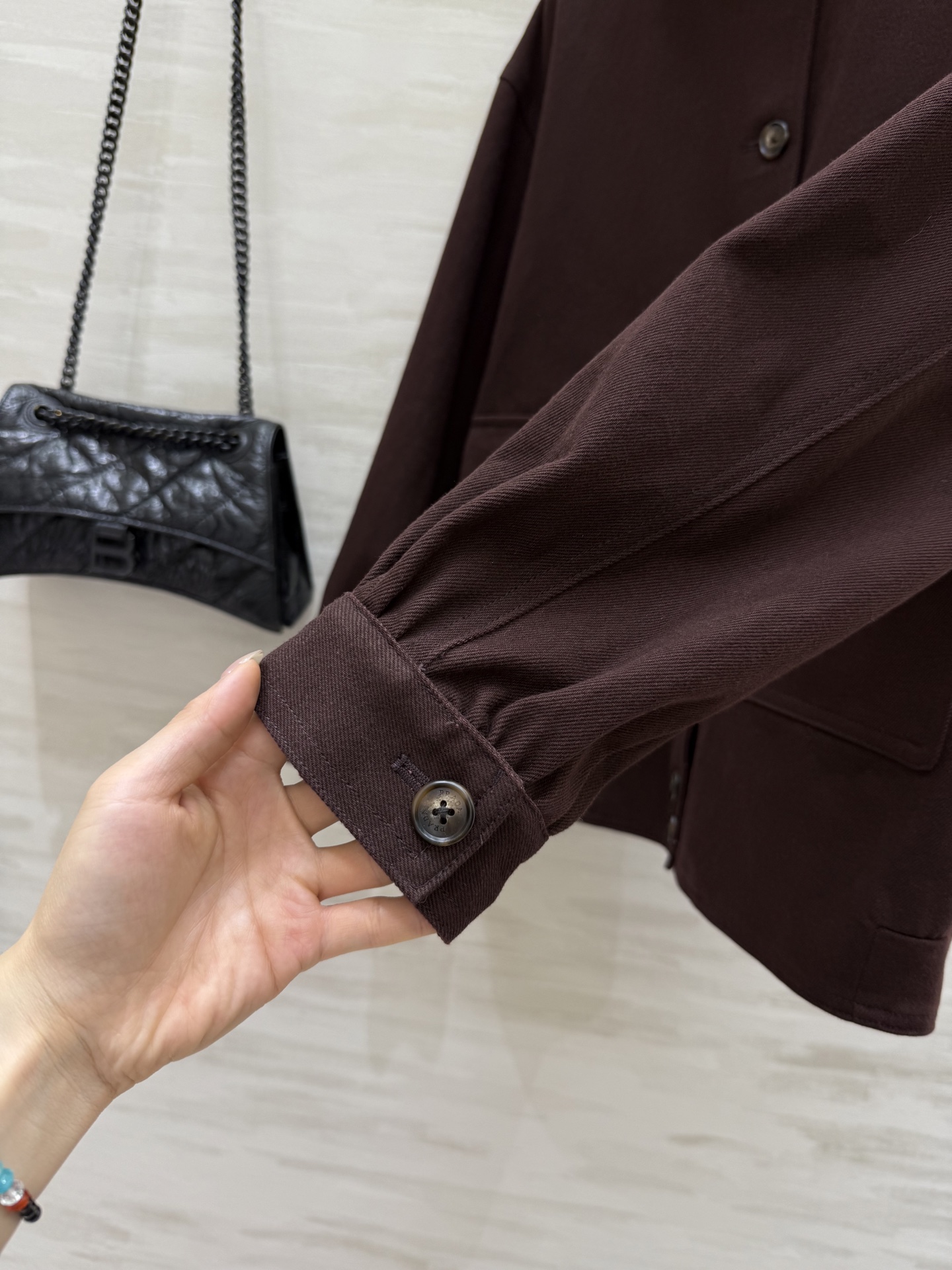 #Prad♡²⁵秋冬新款 双层三角标 立领风衣外套 工装风设计感 可时髦可帅气 街头风满满 经典廓形的剪