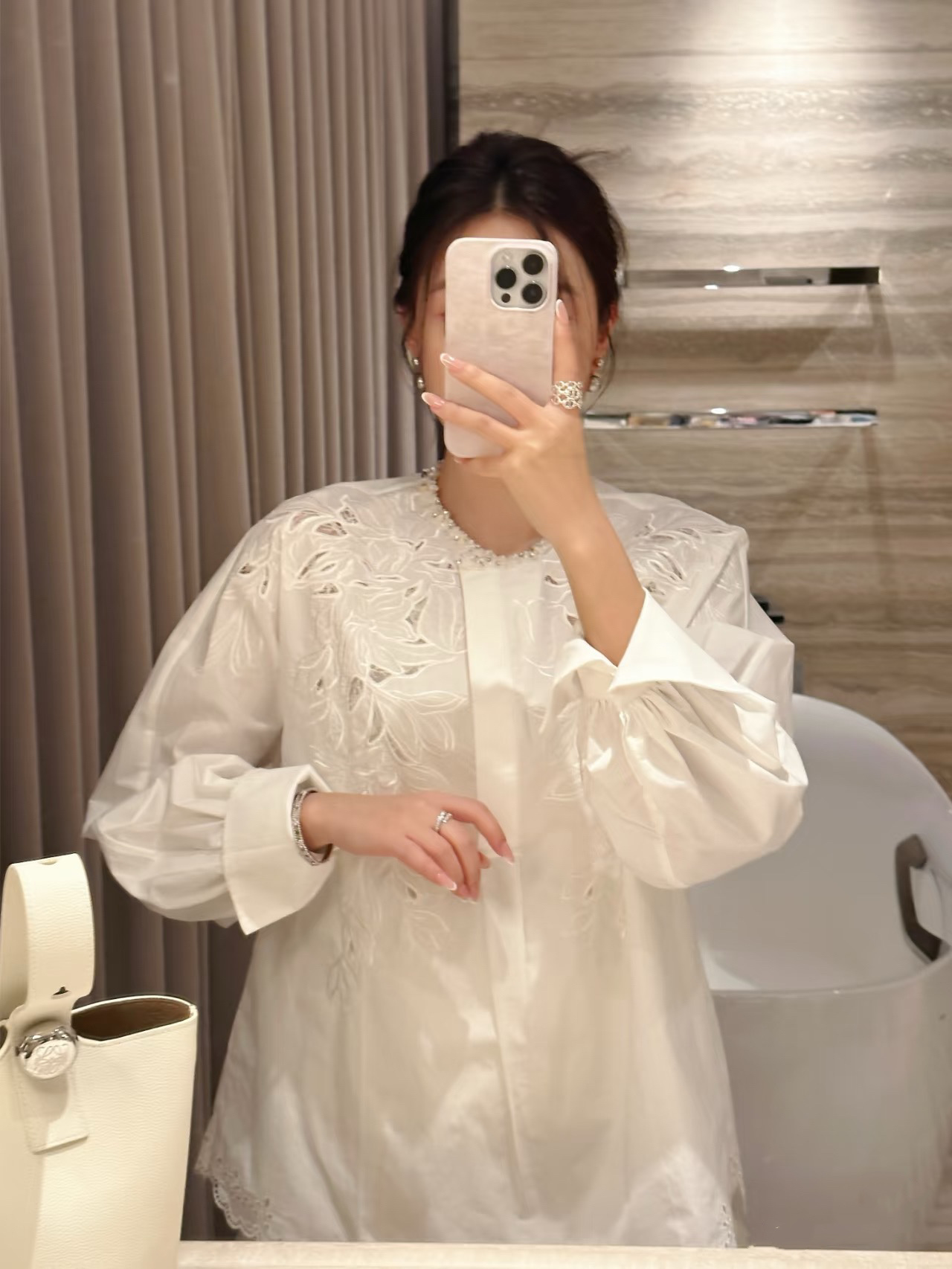 Elegant White Shirt with Exquisite Embroidery Detailing and Pearl Embellishments