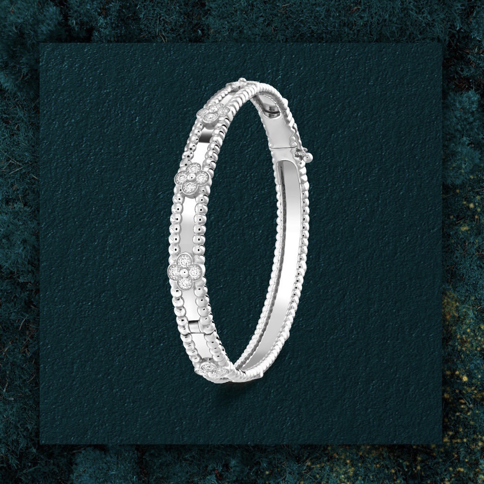 Van Cleef & Arpels Alhambra Diamond Bangle Bracelet - Platinum Gold Finish 3 i1705922528 1405 1