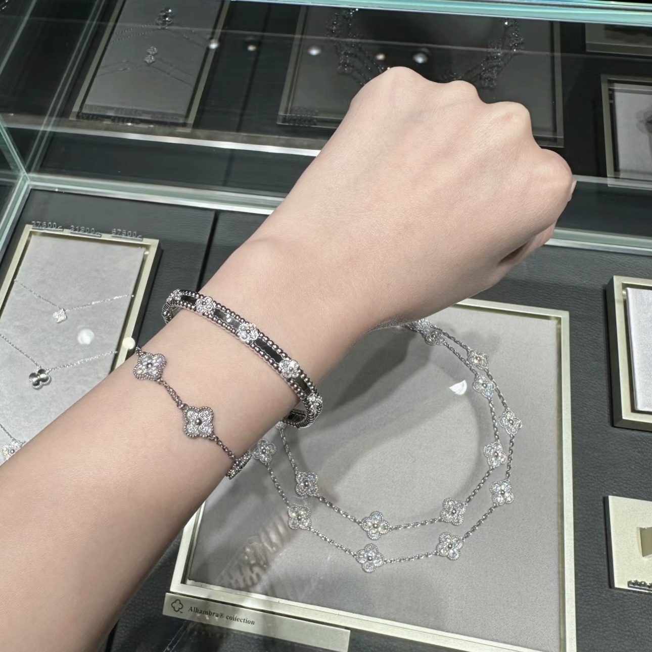 Van Cleef & Arpels Alhambra Diamond Bangle Bracelet - Platinum Gold Finish 8 i1705922528 7864 3