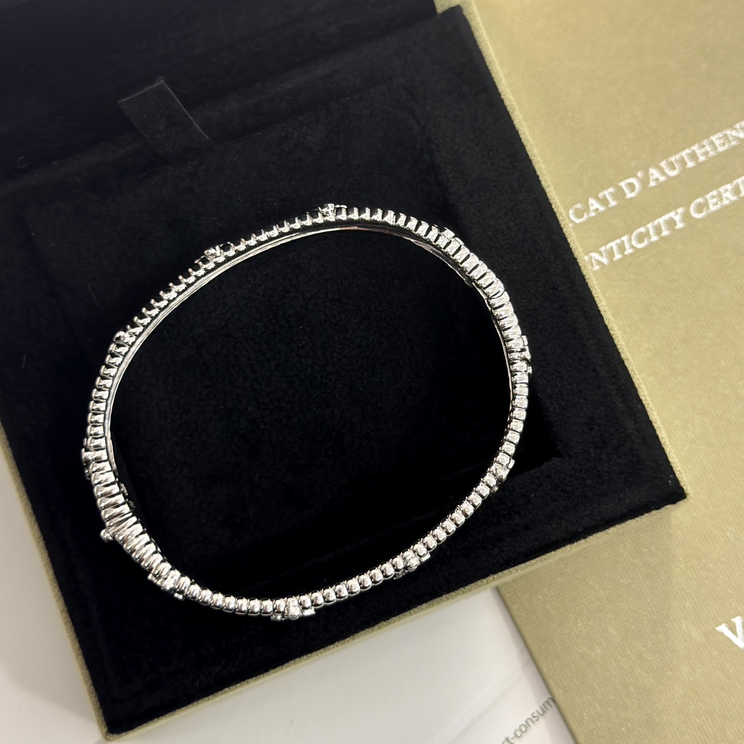 Van Cleef & Arpels Alhambra Diamond Bangle Bracelet - Platinum Gold Finish 9 i1705922563 8989 2