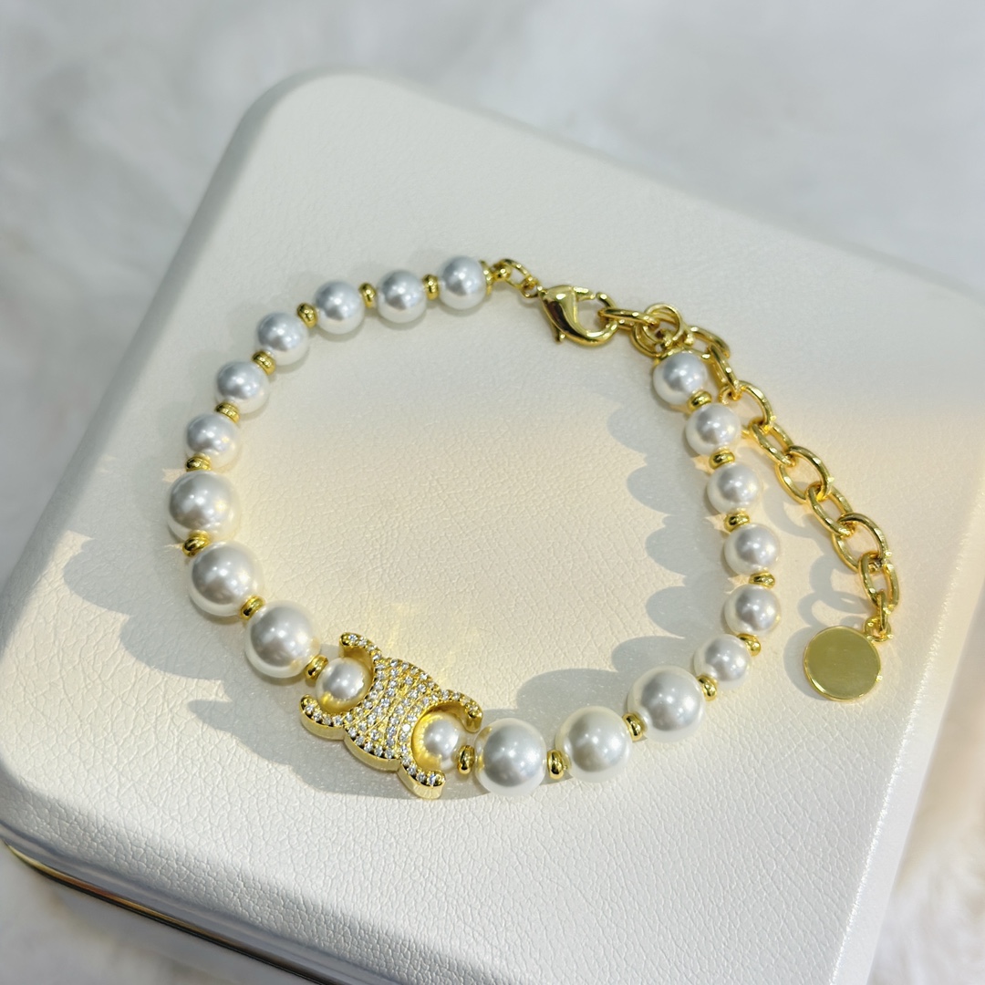 “Celine Jewelry: Artistic Brass Sculptor Designs with Pearls and Drills for Chic Spring Style”