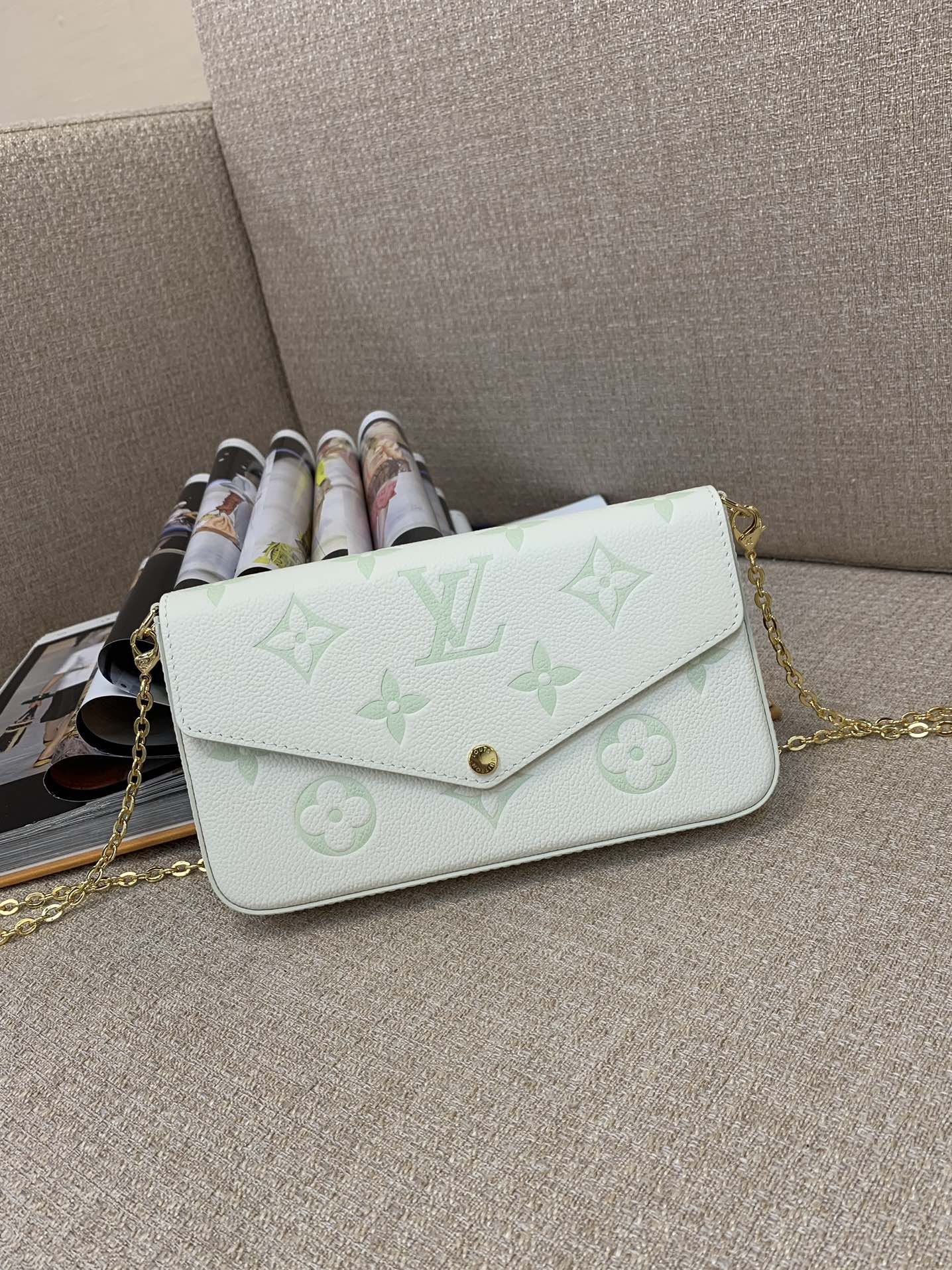 LV Pochette Félicie chaîne Monogram Empreinte cuir design bicolore pochette amovible chaîne épaule bandoulière pochette - qualité supérieure