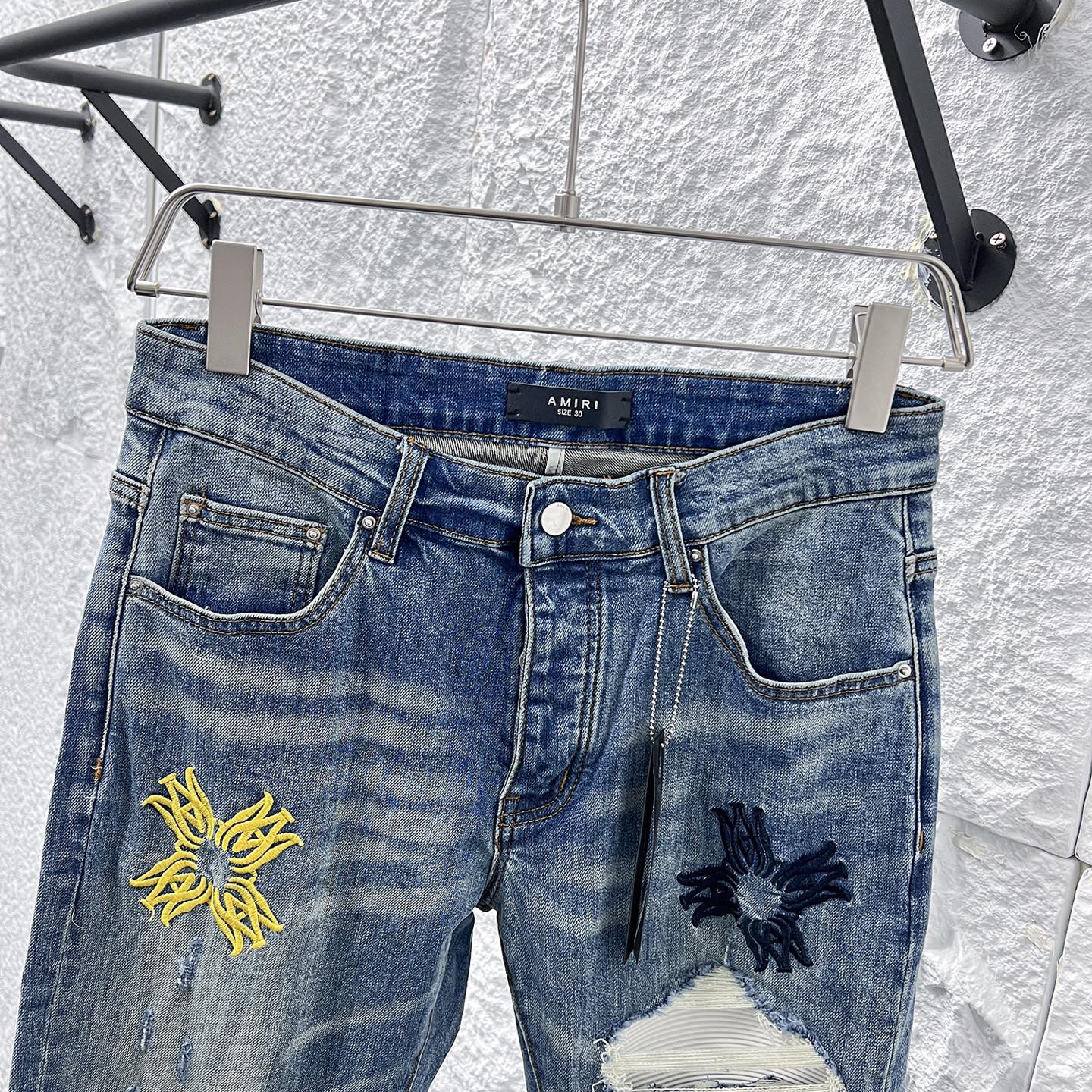 Amiri Distressed Denim Jeans with Floral Patches - Slim Fit, Stylish Design 6 i1748662878813 942 0 5