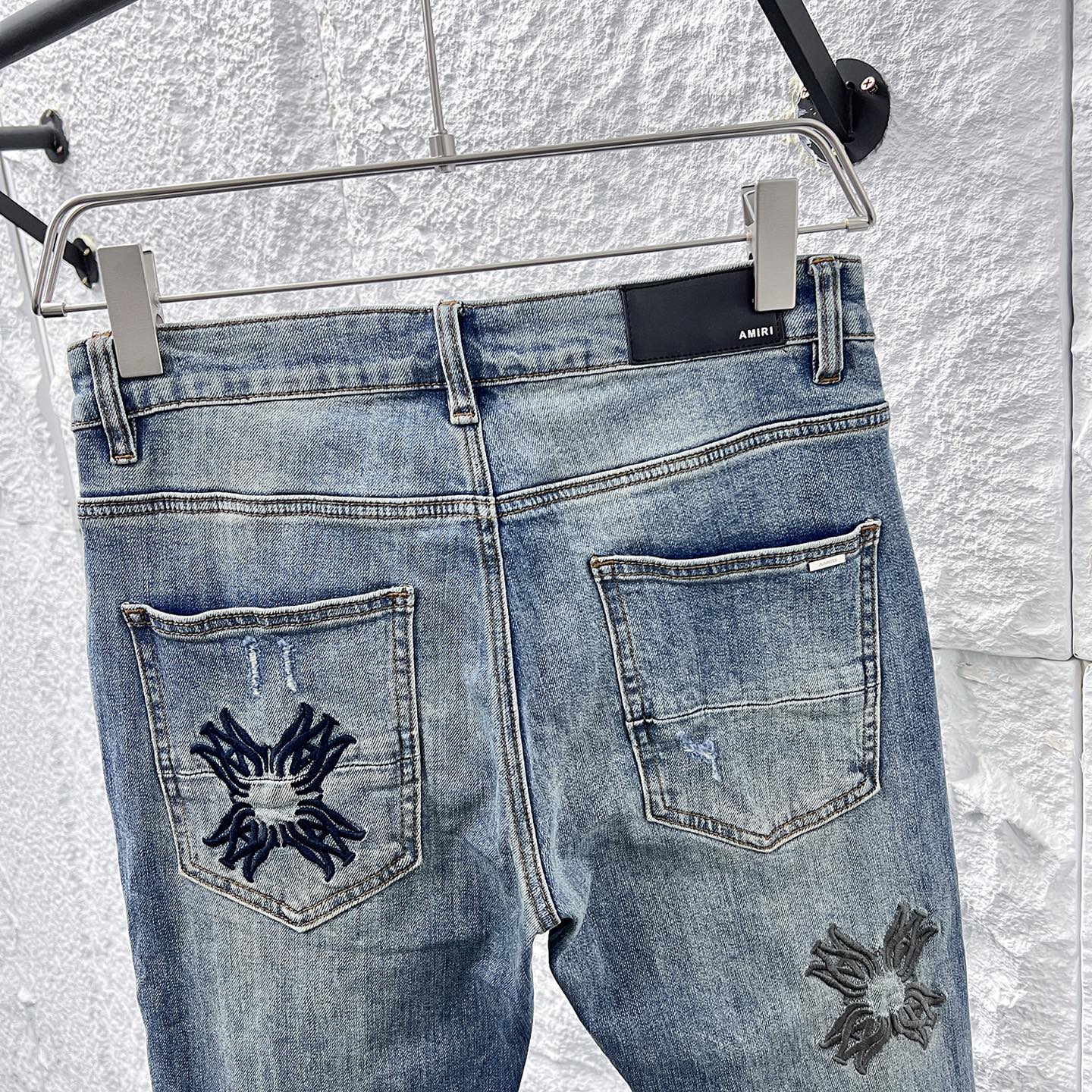 Amiri Distressed Denim Jeans with Floral Patches - Slim Fit, Stylish Design 8 i1748662891424 887 0 7