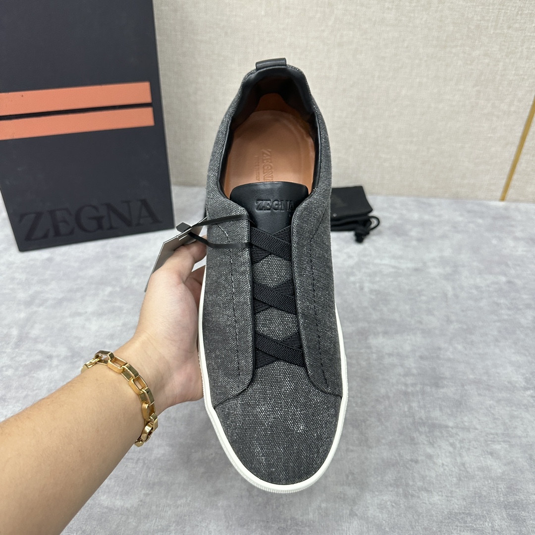 Zegn*/杰尼-亚休闲帆布运动鞋TripleStitch系列是一款精致的休闲鞋履官方8,400饰有标志