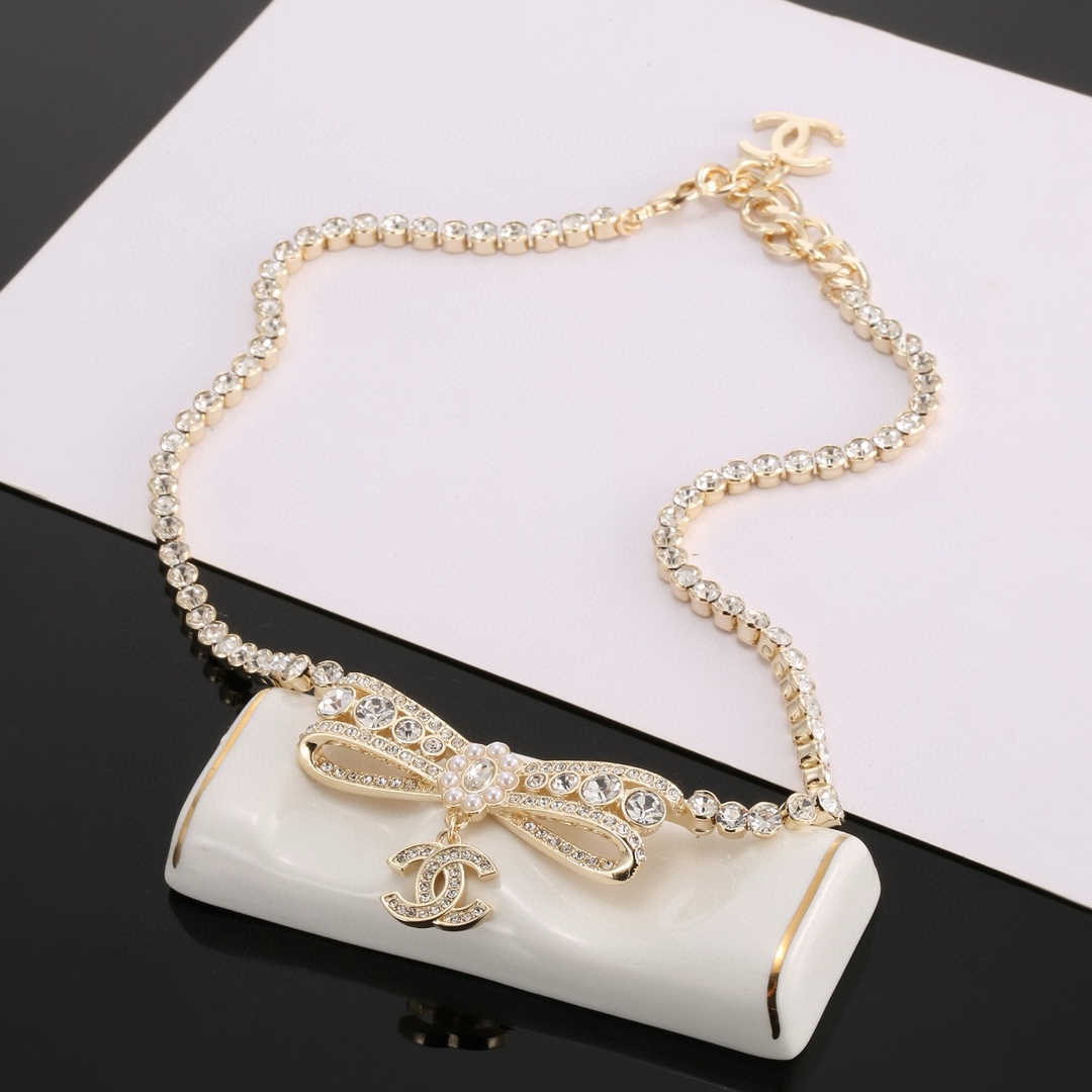 CC Pavé Crystal Bow Necklace - Comprehensive 6
