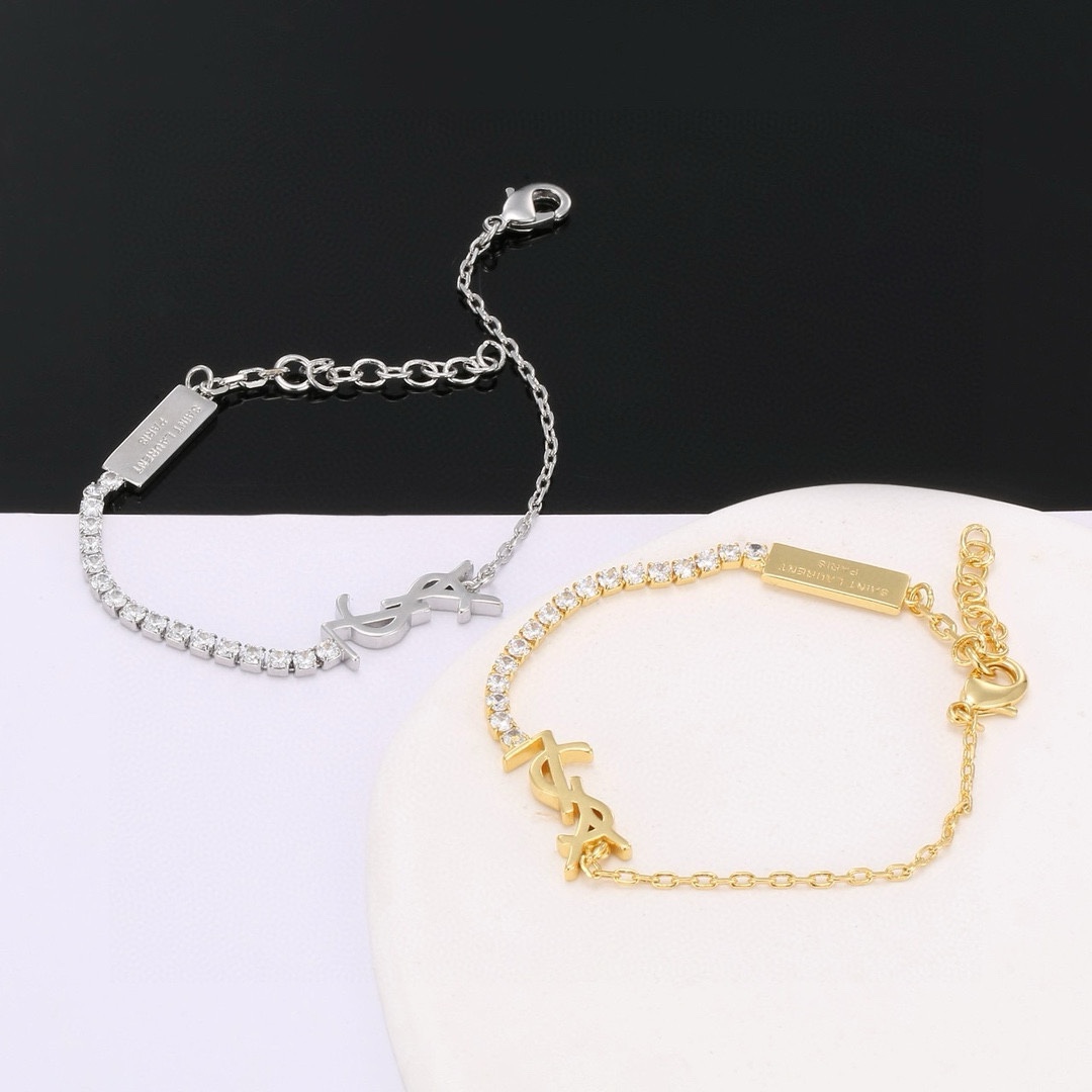 “YSL St. Roland’s Brass Bracelet: Elegant French Fashion Jewelry by Yves Saint Laurent” - 图片 1