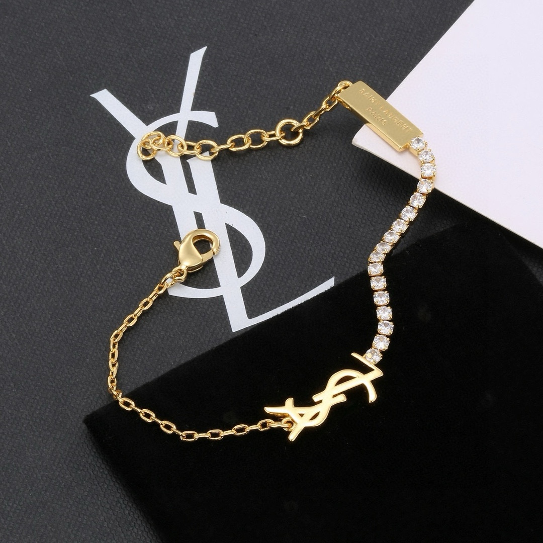 “YSL St. Roland’s Brass Bracelet: Elegant French Fashion Jewelry by Yves Saint Laurent” - 图片 5