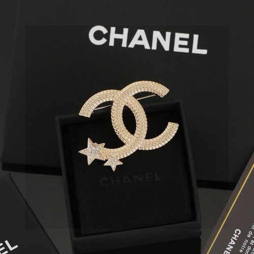 Chanel Brooch with Crystal-Encrusted CC Logo and Star Charms - Elegant Design 1 Chanel Brooch with Crystal-Encrusted CC Logo and Star Charms - Elegant Design