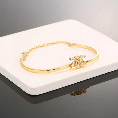 Celine Triomphe Gold-Tone Finish Brass Bracelet for Women 1 Celine Triomphe Gold-Tone Finish Brass Bracelet for Women