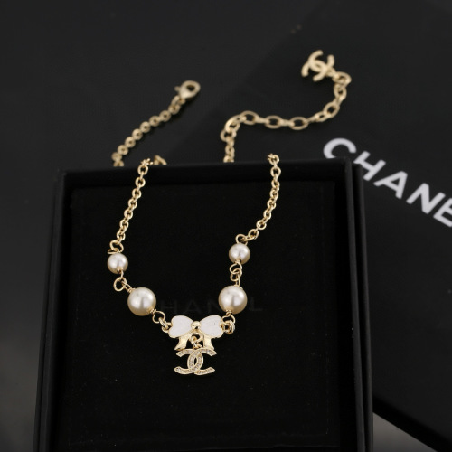 Chanel Bow Pearl Necklace, Gold-Tone Finish, Elegant Design & Lasting Color 1 Chanel Bow Pearl Necklace, Gold-Tone Finish, Elegant Design & Lasting Color