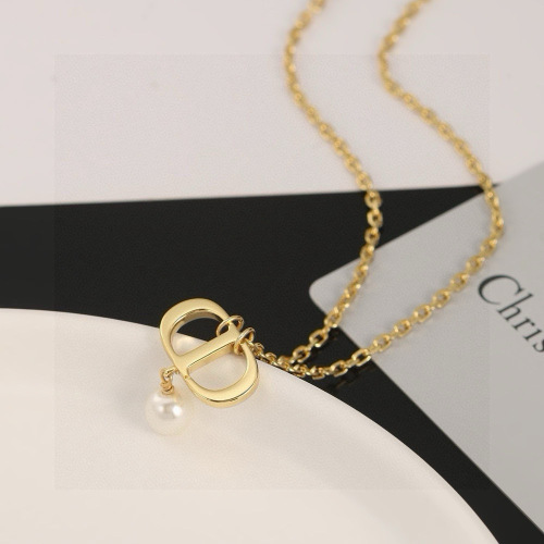 Dior CD Necklace - Elegant Pearl Pendant with Gold-Tone Metal Finish 1 Dior CD Necklace - Elegant Pearl Pendant with Gold-Tone Metal Finish