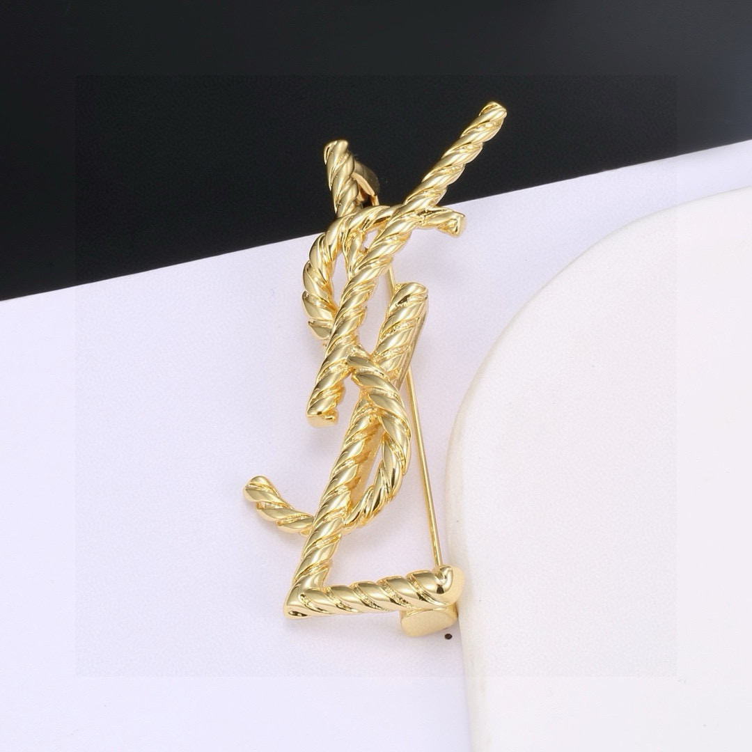 圣罗兰YSL 胸针 经典奢侈   时尚百搭 犹如酒会礼服一般，绚烂多姿。经典 最具个性魅力象征永远的不变