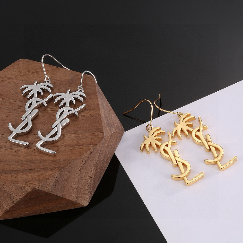 Saint Laurent YSL 1961 Palm Tree Monogram Drop Earrings earrings Polished gold-tone metal gold variant and polished silver-tone metal silver variant no accent stones 4 5cm drop length