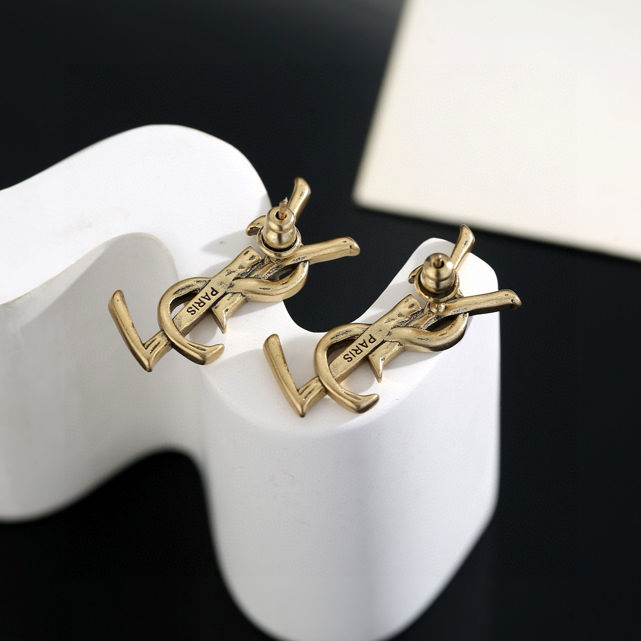 Saint Laurent Cassandre Monogram earrings antique gold metal 2cm length