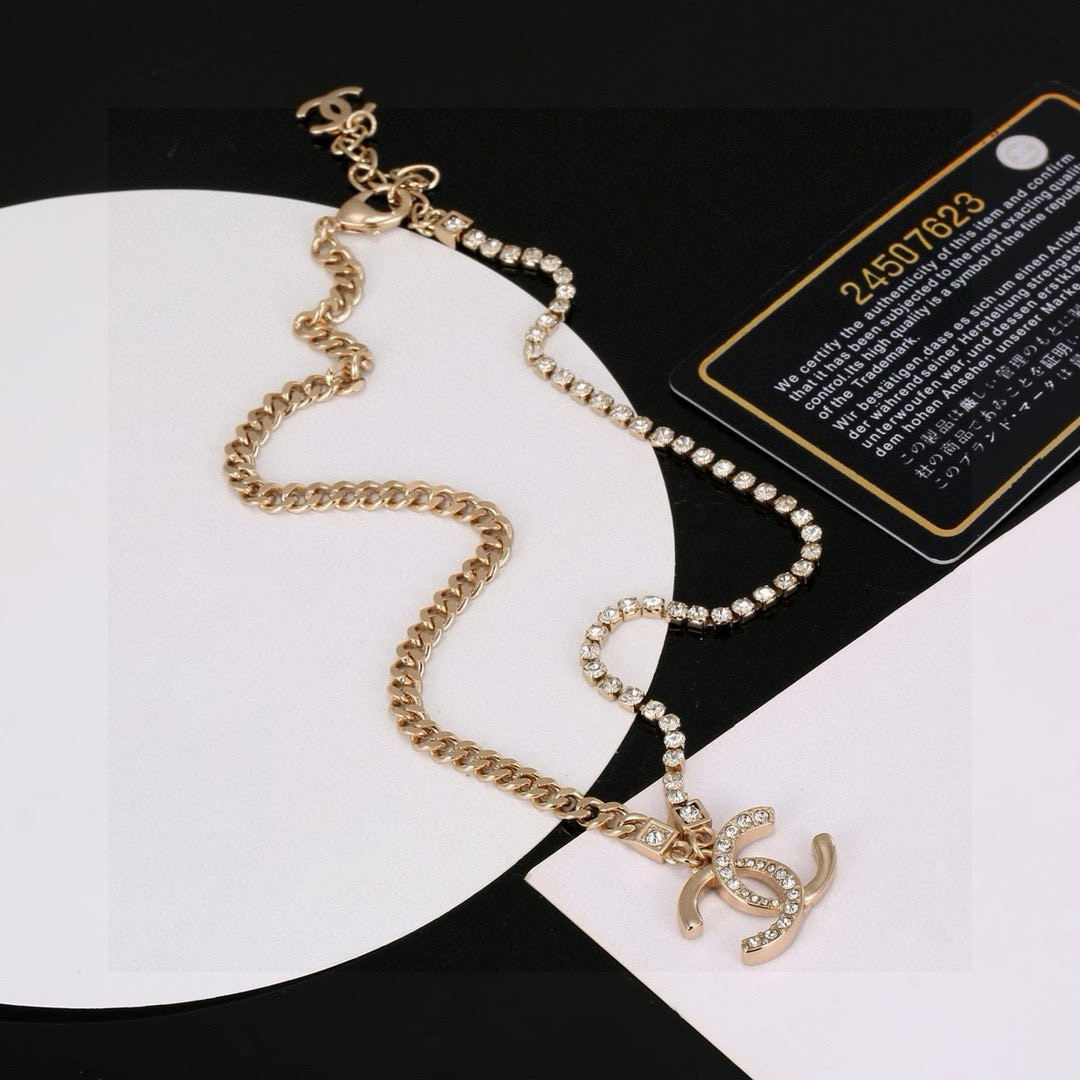 Chanel CC Logo Crystal Pendant necklace Gold-tone metal with clear crystal accents 42cm