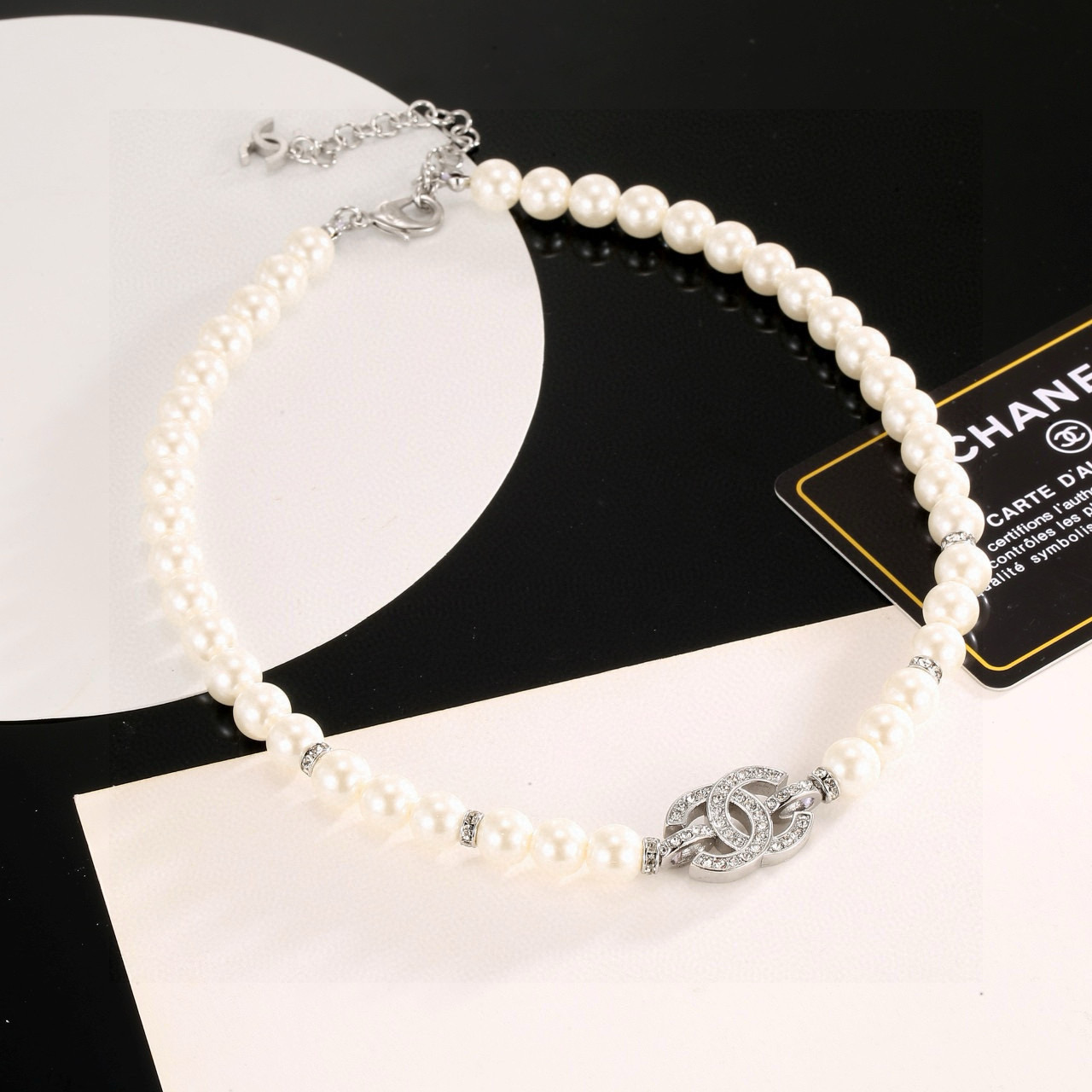 Chanel 2025 Spring Summer CC Logo Pearl Choker necklace Silver-tone metal cream white pearls clear crystal rhinestones Adjustable choker length with 5cm extension chain main length approx 38cm