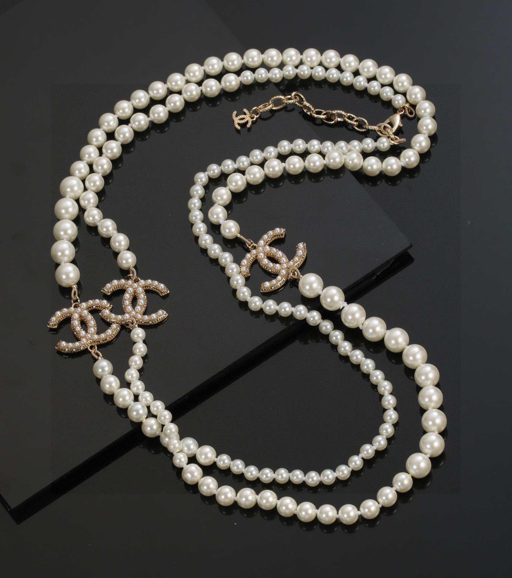 Chanel CC Logo Multi-Charm Pearl Long Necklace necklace Gold-tone metal cream white faux pearl clear crystal 80cm with 5cm extension chain