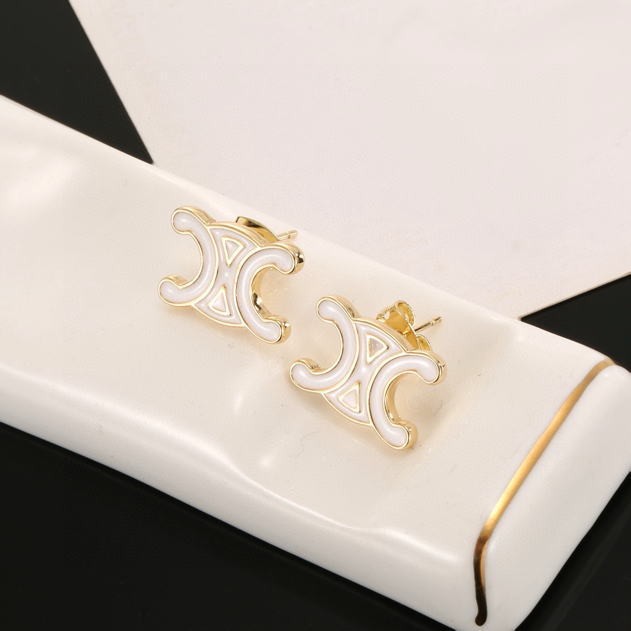 Celine Triomphe earrings gold-tone metal with white enamel 1 5cm stud diameter