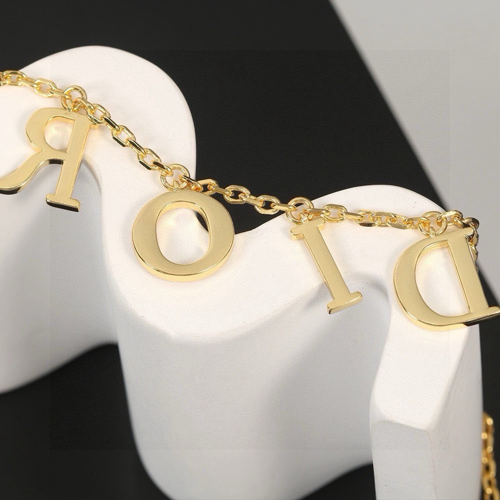 dior diorevolution gold letter charm necklace