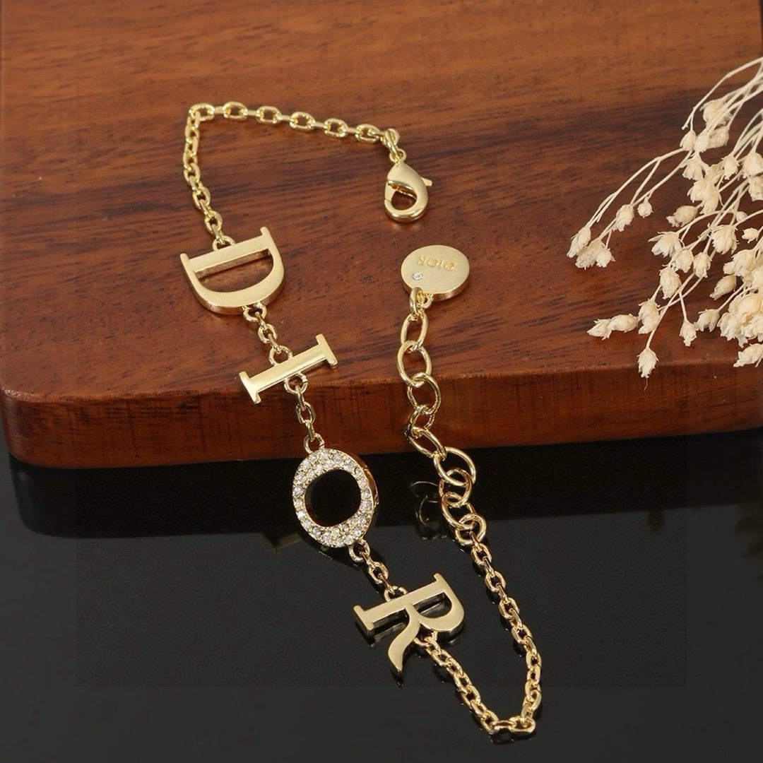 dior diorevolution gold letter charm necklace