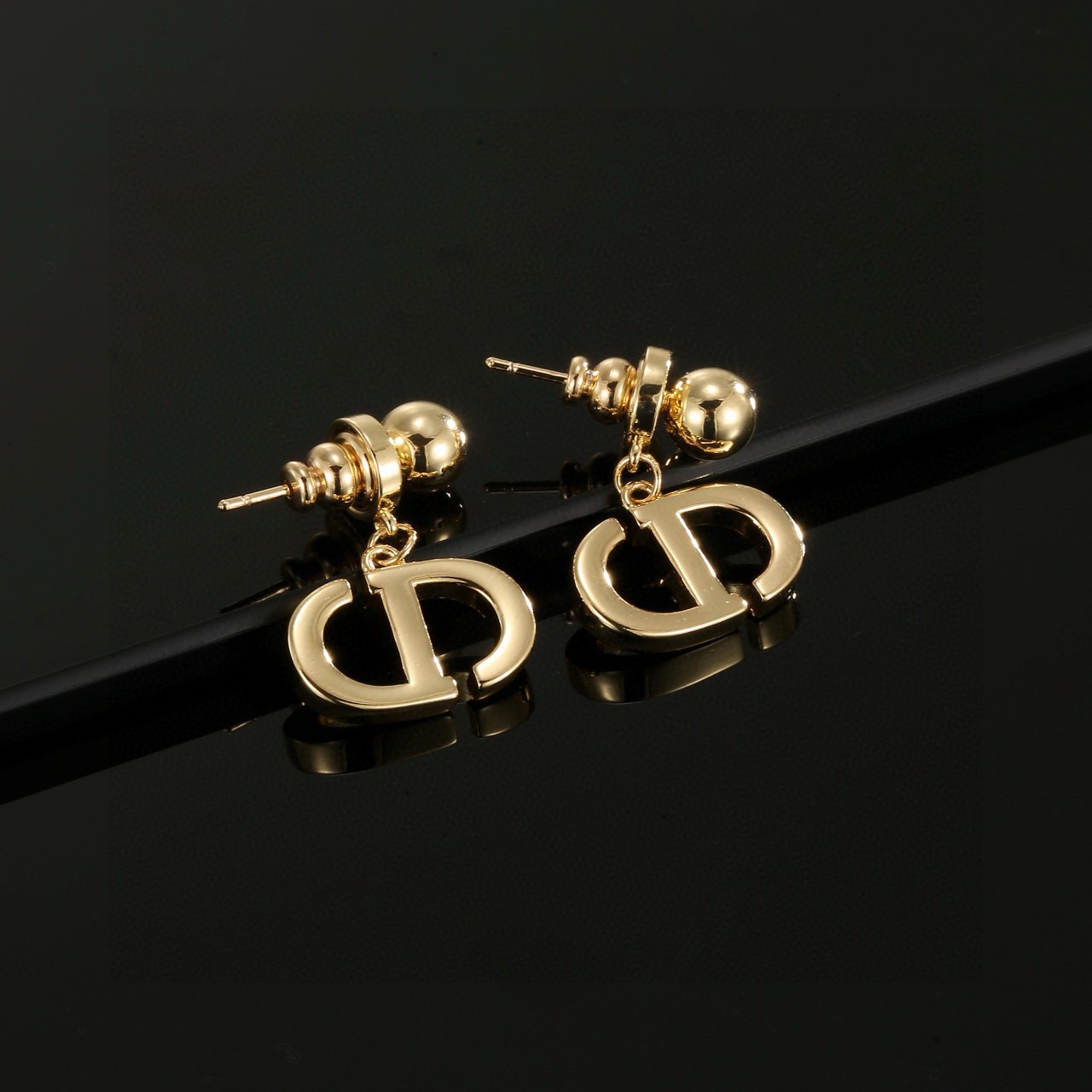 dior gold cd signature drop earrings
