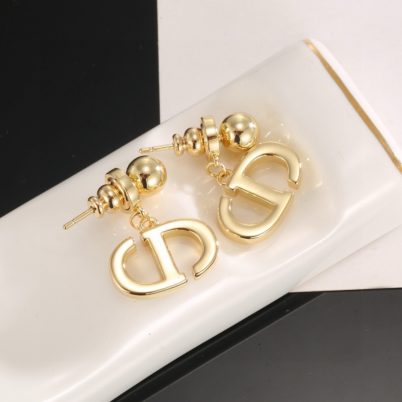 dior gold cd signature drop earrings