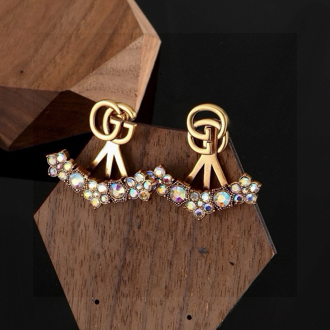 gucci double g pearl fringe earrings