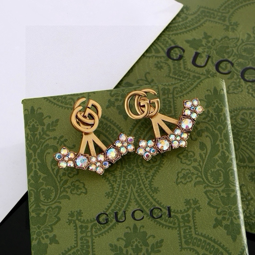 gucci double g pearl fringe earrings