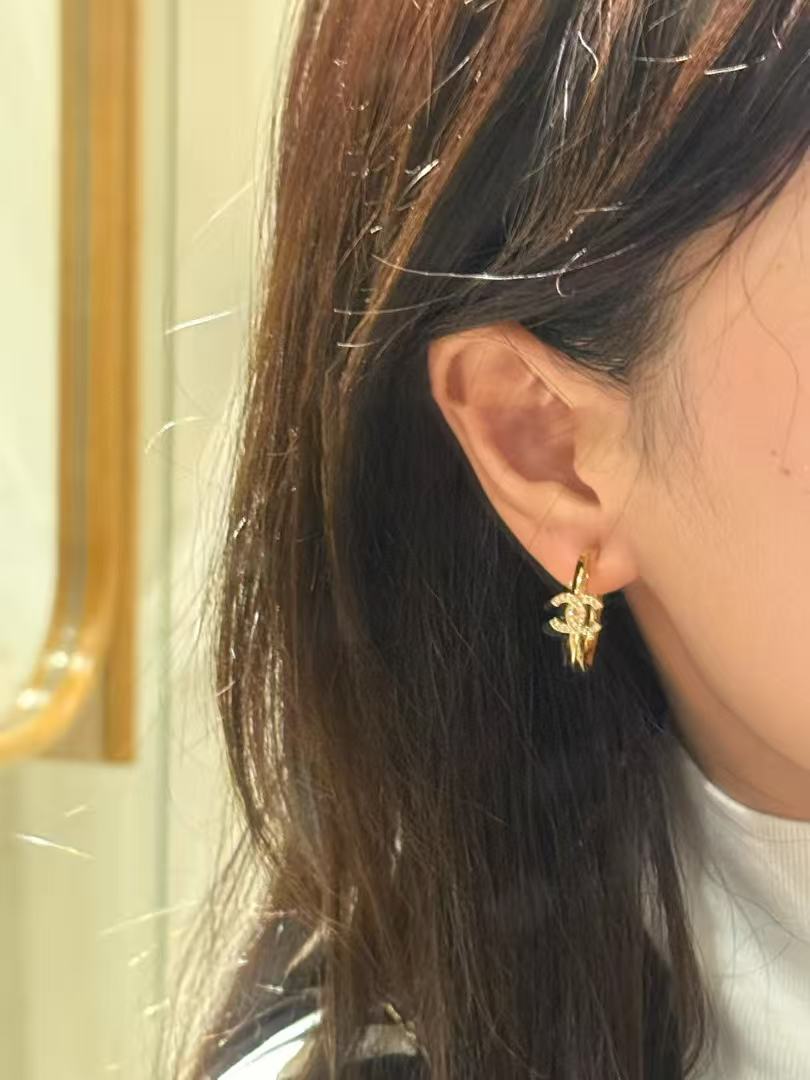 chanel pale gold cc pendant hoop earrings